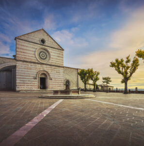 Assisi, Santa Chiara Basilica church at sunset. Perugia, Umbria, Italy, Europe.